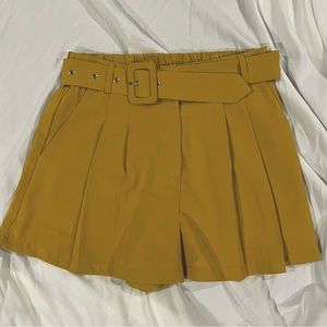 Mustard pleated shorts